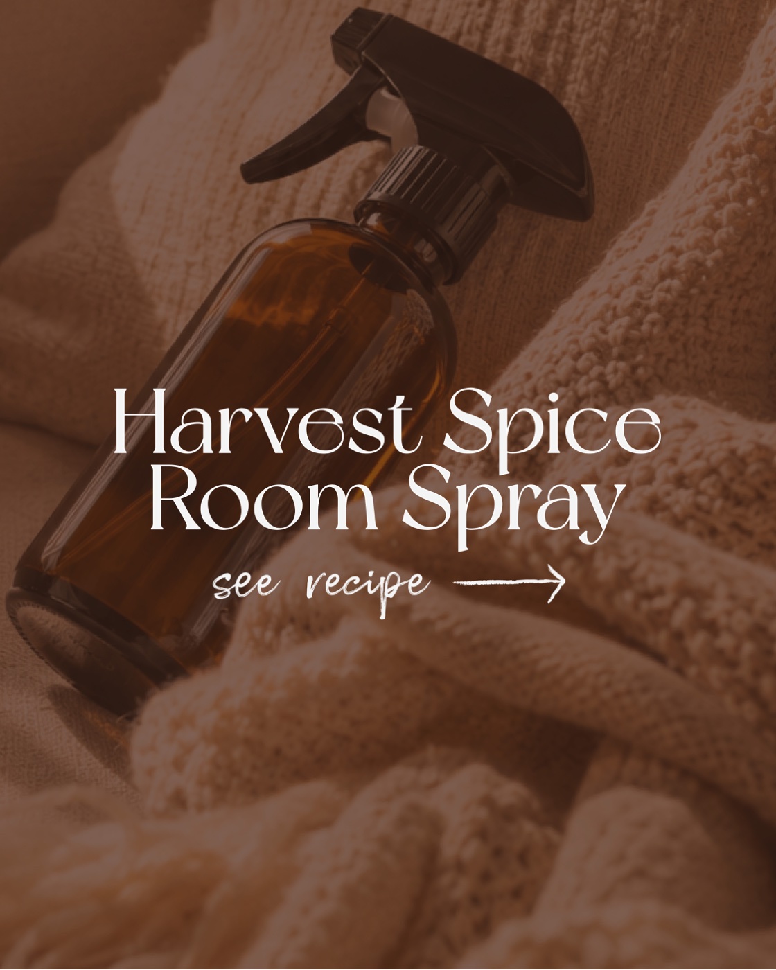 Harvest Spice Room Spray in an amber glass spray bottle on folded towels